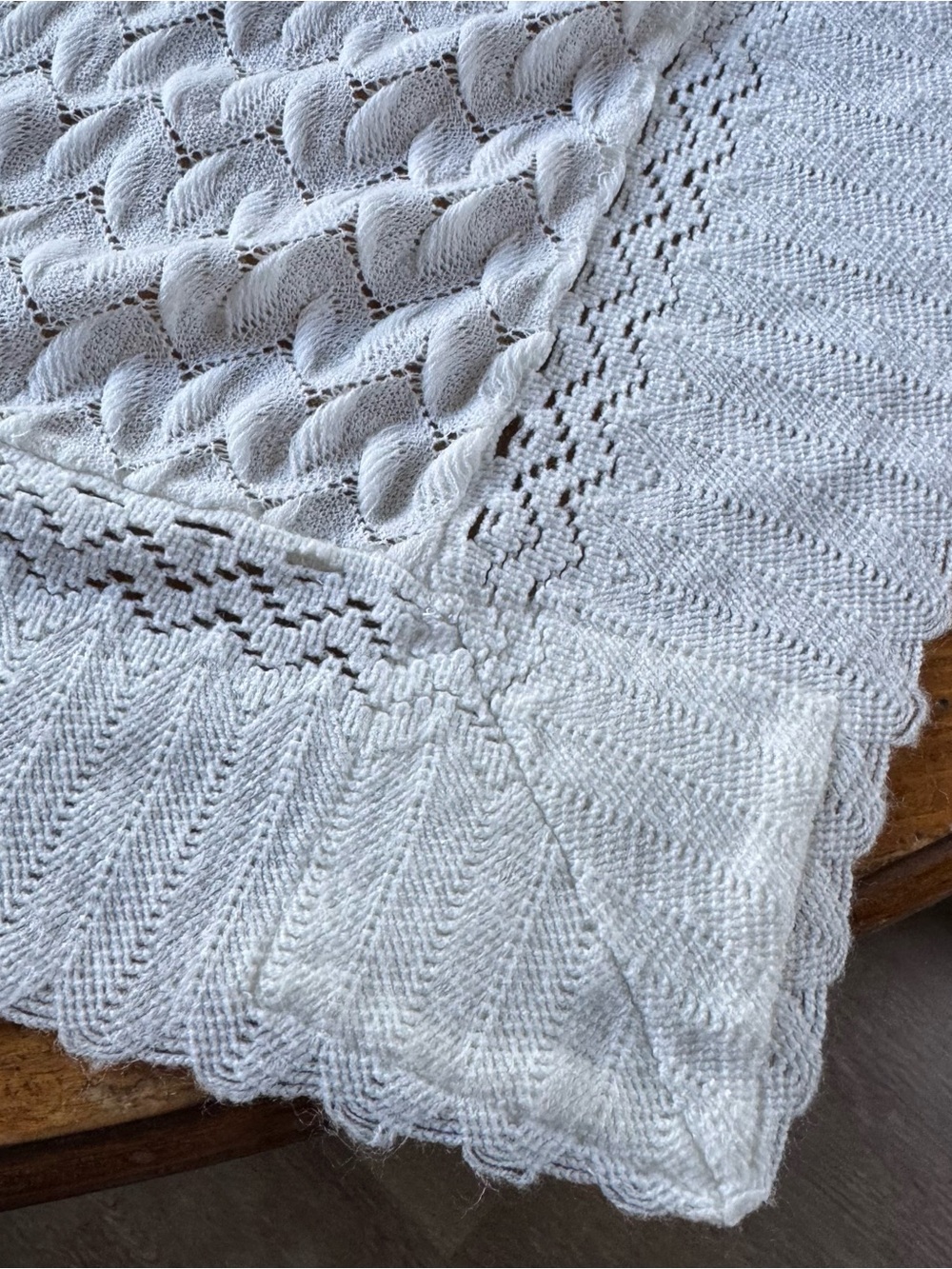 New Vintage White Knit Cable Knit Baby Blanket Throw
39”x 41” 
Does have a coupl